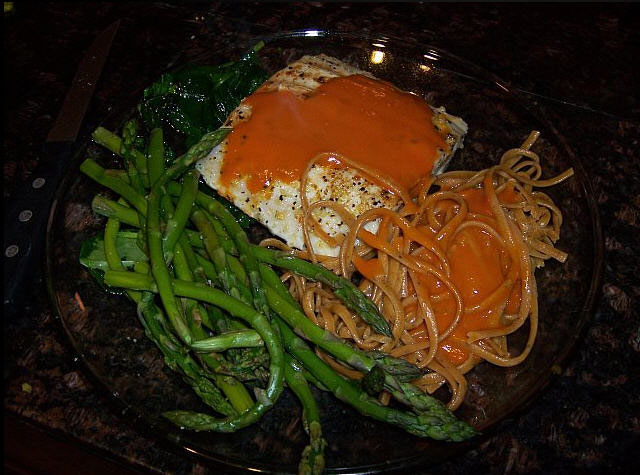 Healthy Eats! Grilled Mahi Mahi, Asparagus, and Whole Grain Pasta with Roasted Red Pepper and Tomato Sauce.