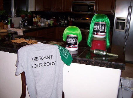 Tab and Chelle's green wigs, our team shirt for PT 101, and Beverly Ultimate Muscle protein powder